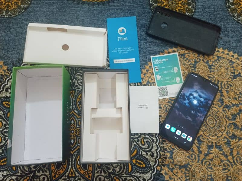 Infinix hot 8 with original box and charger 4gb ram 64 rom in sialkot 0