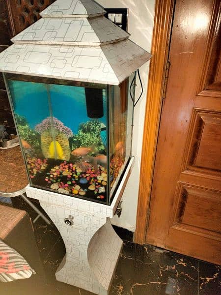 Aquarium . . with 3 fish +fish food 1