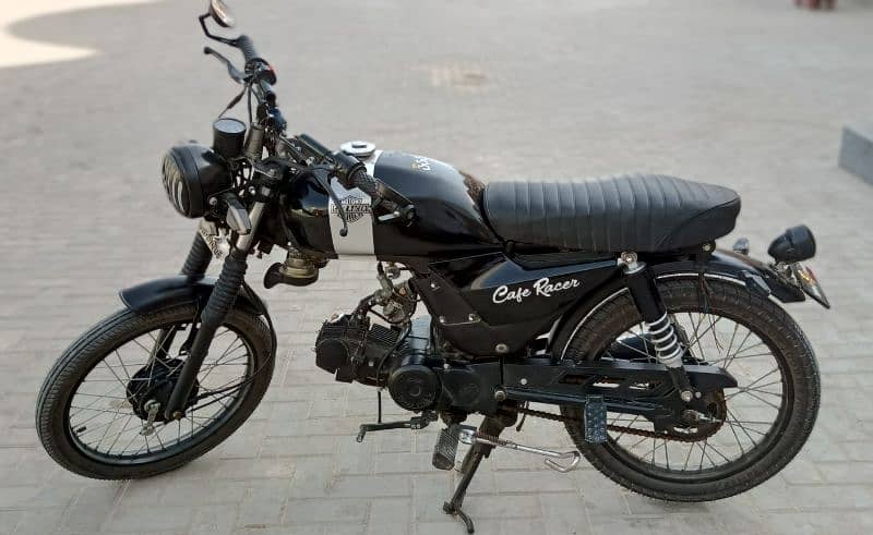 70 cc bike full modifie ki ha Cafe racer ma number Karachi 0