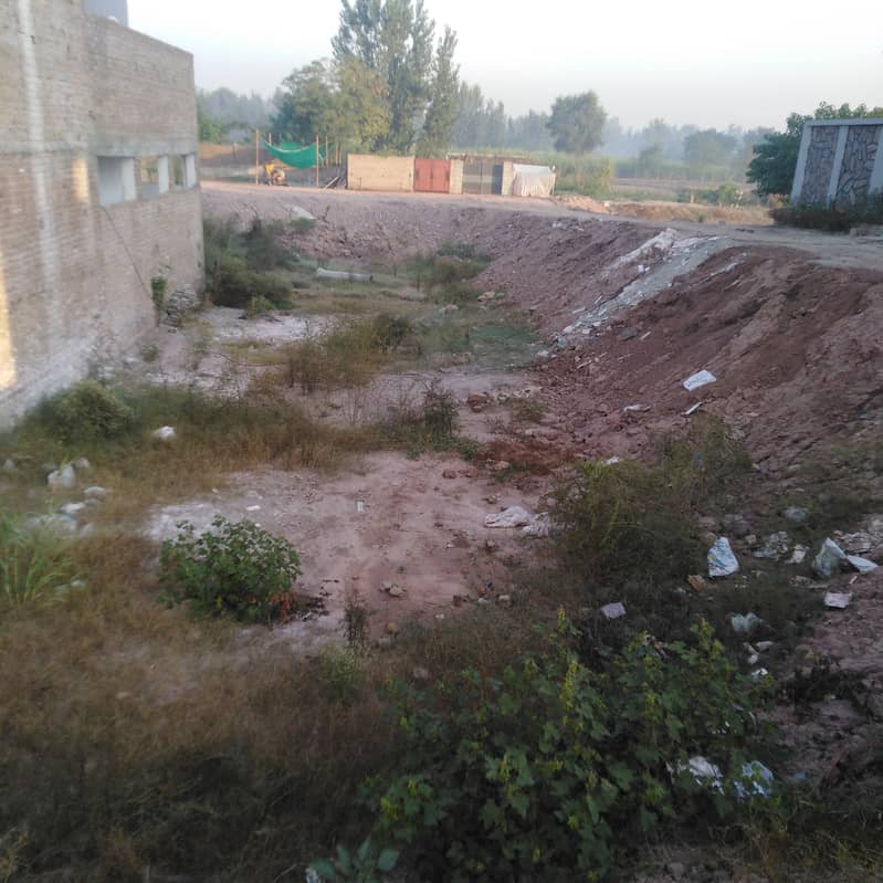 4marla full basement plot situated in Almoeez Life darmangi Warsak Rd 1