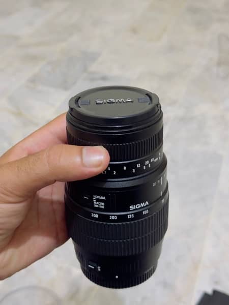 Canon 1200 d with 70-300 sigma lens , extra battery 3