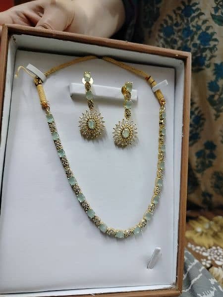 earrings and necklace new condition 8