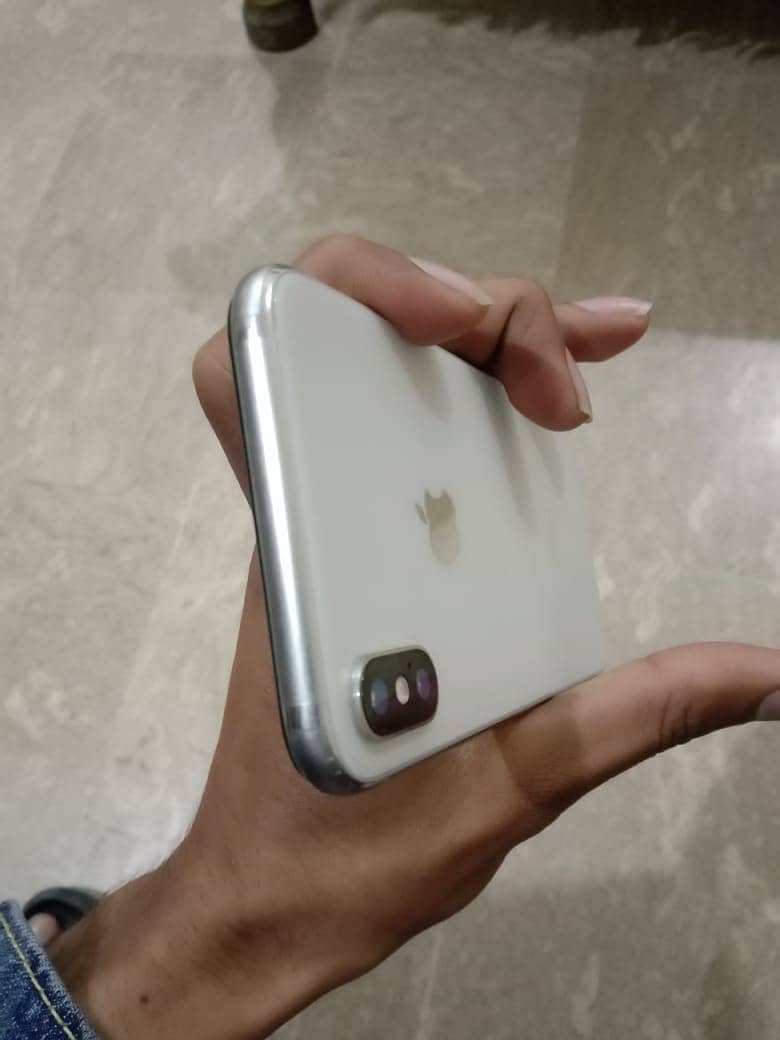 iphone x pta proved 64gb true tone and face id all ok Water pack 1