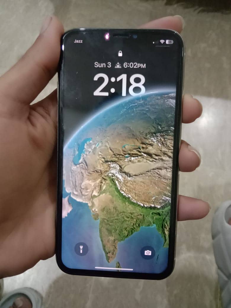 iphone x pta proved 64gb true tone and face id all ok Water pack 2