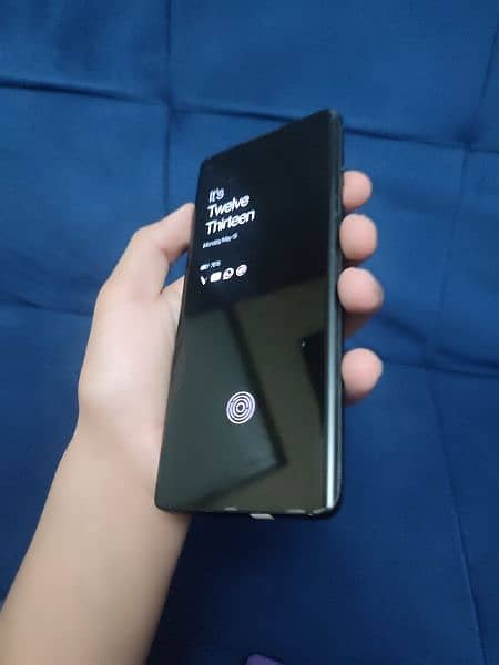 One plus 8 5G with a curved amolated display. 9
