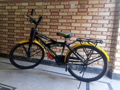 yellow bicycle in good condition