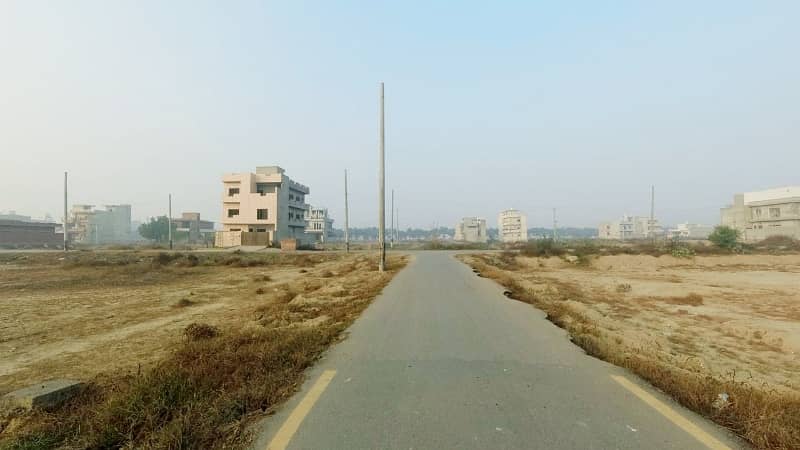 10 Marla Plot For Sale On 60ft Road Near Park In LDA Avenue One Lahore 0