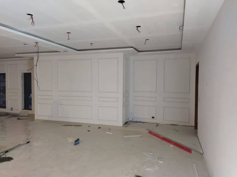 kitchen cabinets/epoxy floor/wooden work/vinyl flooring/wall molding/g 7