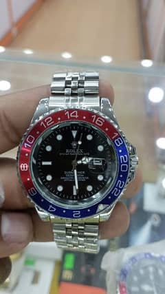 Brand new watch red and blue bazel black dial
