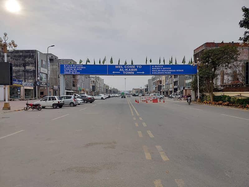 5 MARLA COMMERCIAL CORNER PLOT WITH POSSESSION MAIN 80 FEET ROAD WITH 30 FEET PARKING IN AL KABIR TOWN PHASE 2 CLOCK A 3