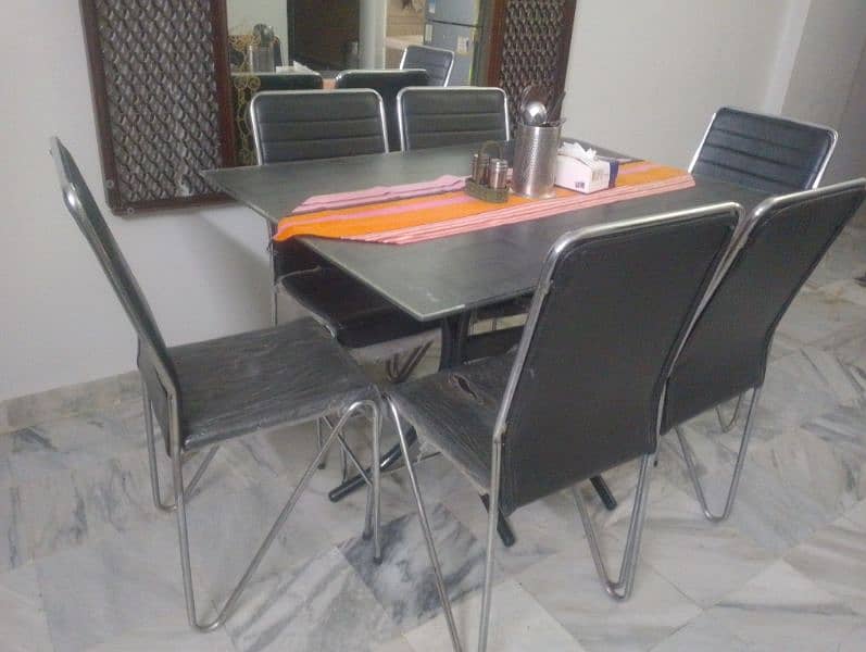 6 seater glass table (black and silver colour) in affordable price 3