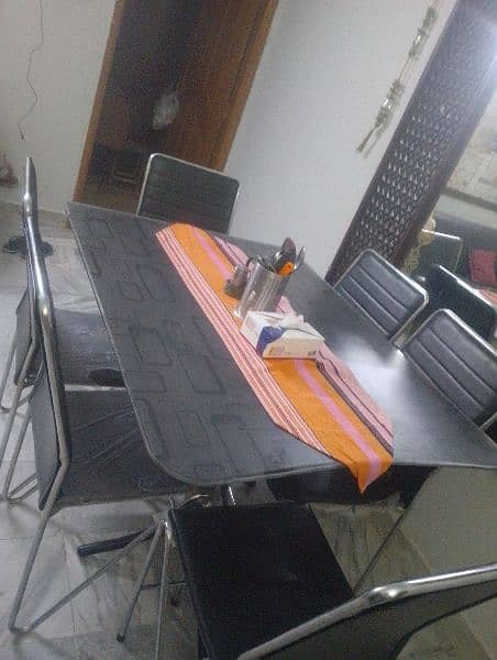 6 seater glass table (black and silver colour) in affordable price 4