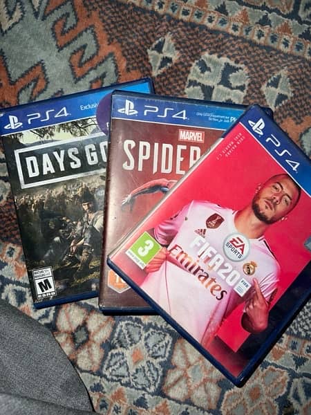 ps4 pro with 2 controllers and 2 games:spiderman and days gone 3