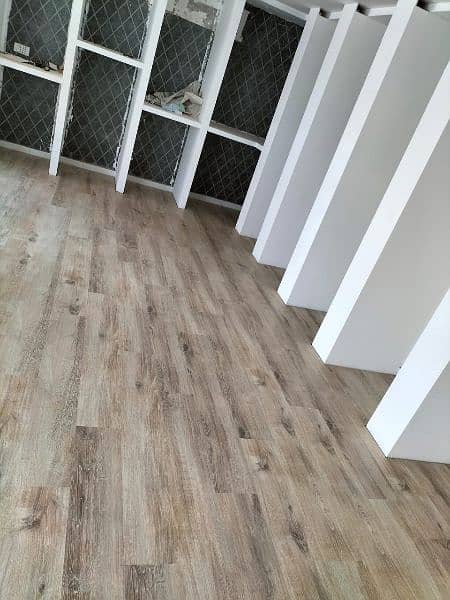 Herringbone Wooden floors/ wallpaper/ blinds/ carpet tiles flooring. 2
