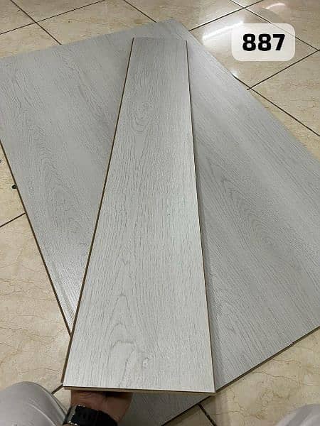 Herringbone Wooden floors/ wallpaper/ blinds/ carpet tiles flooring. 3