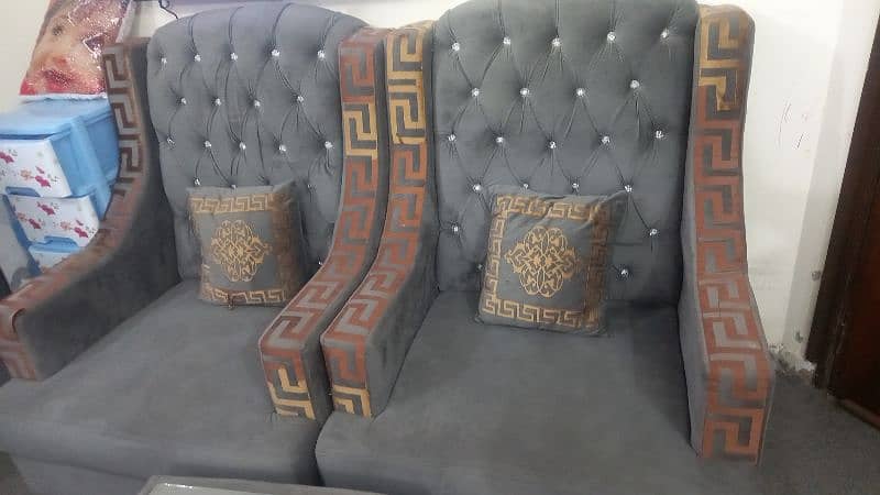 2 sofa chairs with mirror table 3