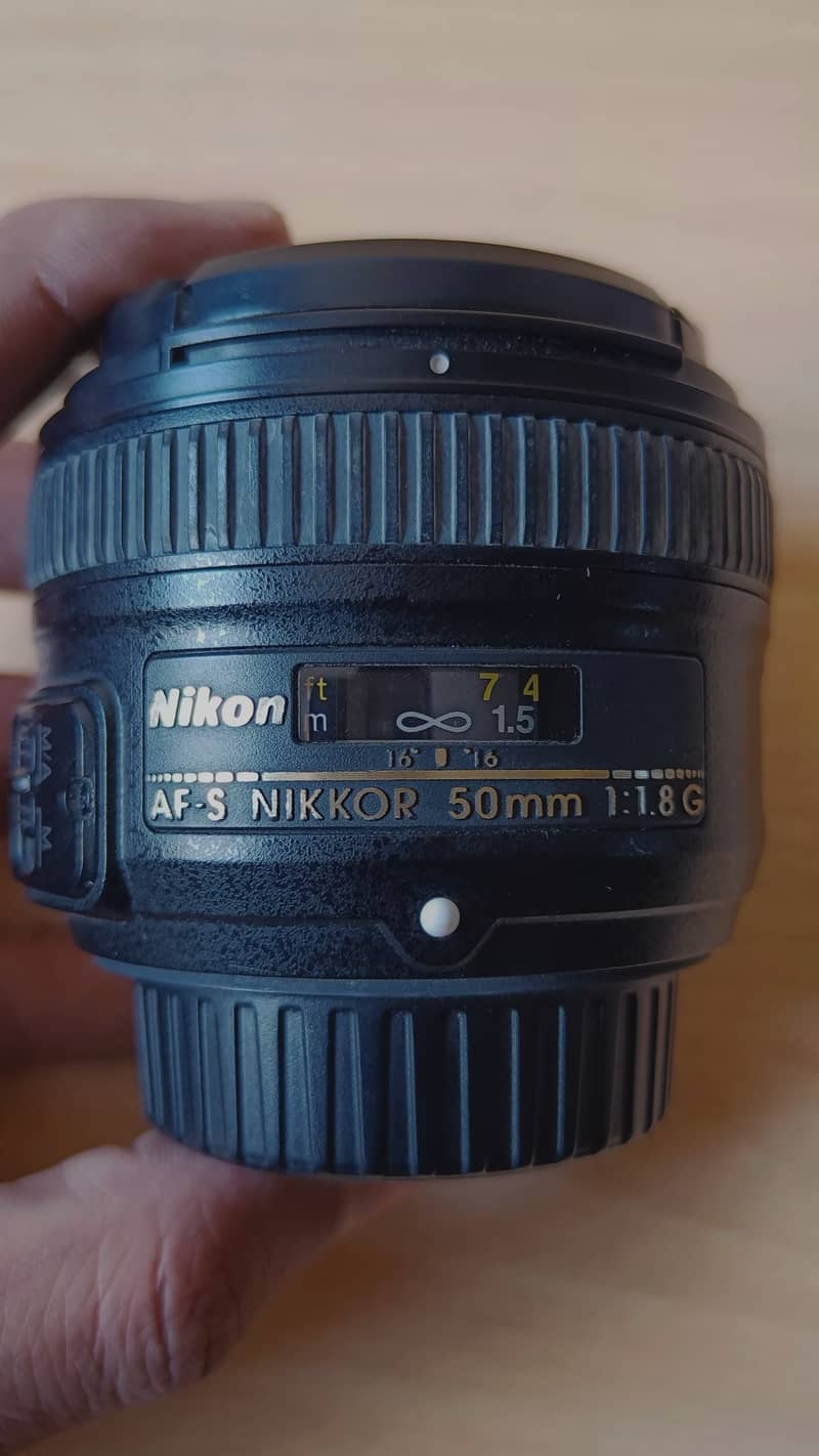 Nikon 50mm f/1.8 G lens with box 4