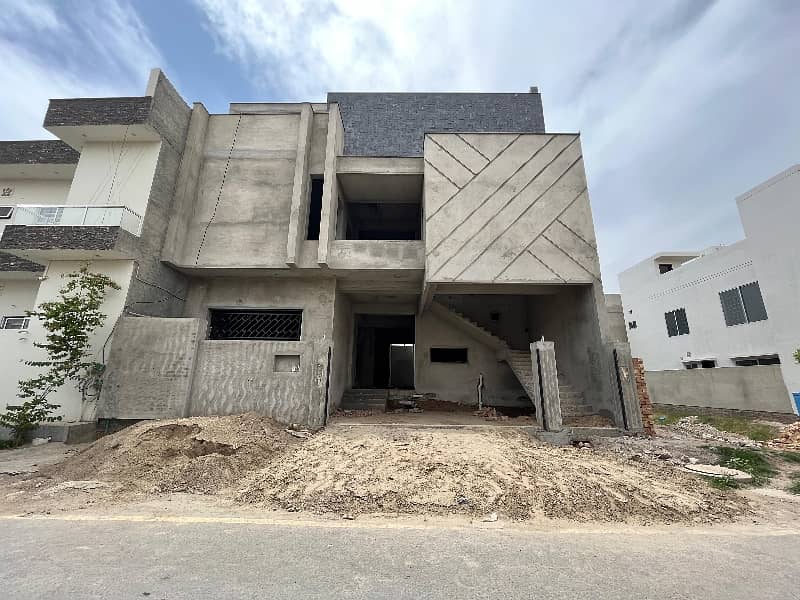 10 Marla Triple Storey Grey Structure House For Sale 0