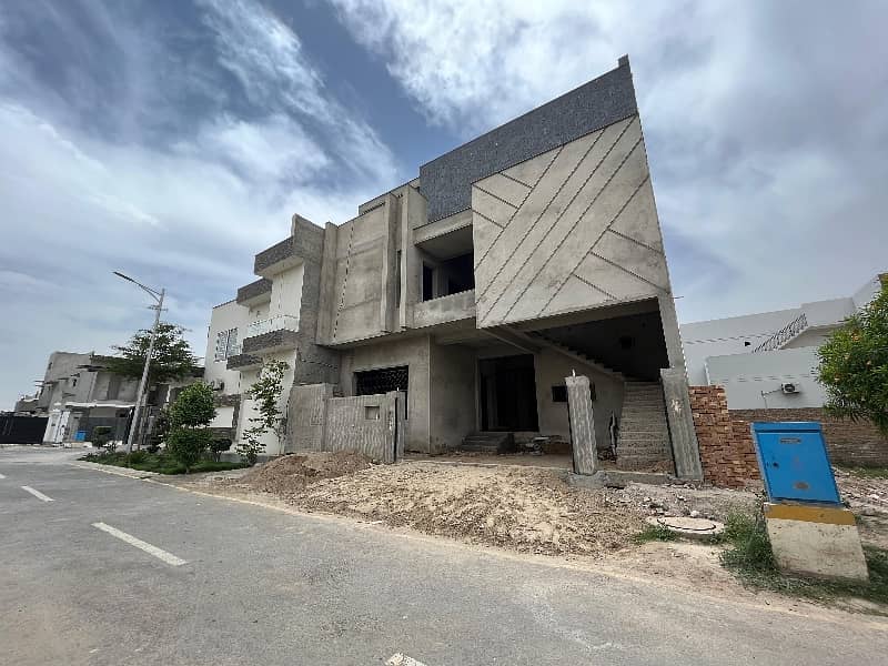 10 Marla Triple Storey Grey Structure House For Sale 1
