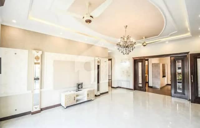 A well Design1 kanal house in Dha phase 6 is up for sale at very reasonable price limited time option near Raya Golf club in lahore 1