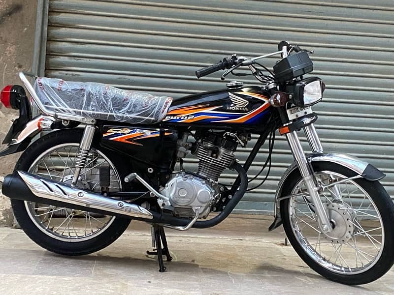 Honda 125  model  2018 achi bike leny waly bhai rabta kren 7