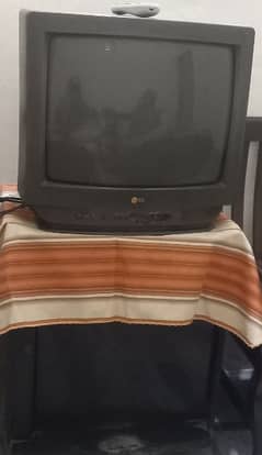 LG tv with black trolley. 0