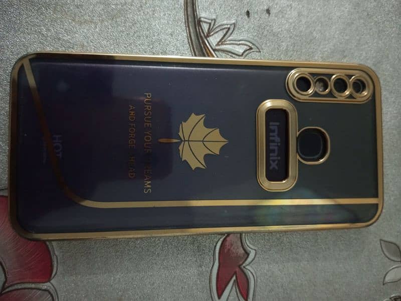 infinix Hot 8  (2/32) back cover and OG front protector 2