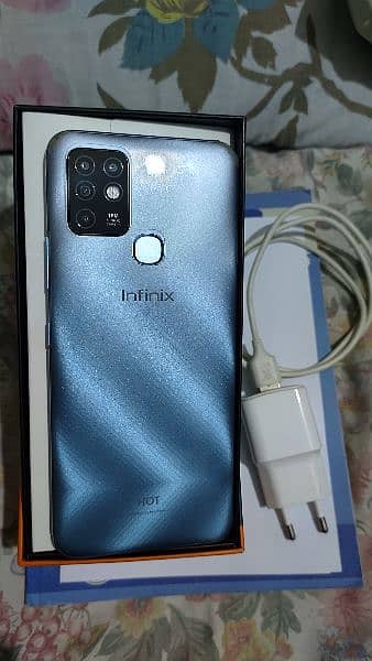 Infinix Hot 10 4/64 Blue with charger and complete box 8