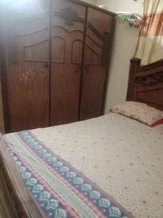 wooden bed set in good condition