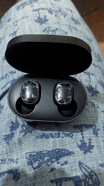 mi xiomi earbuds new in condition 8