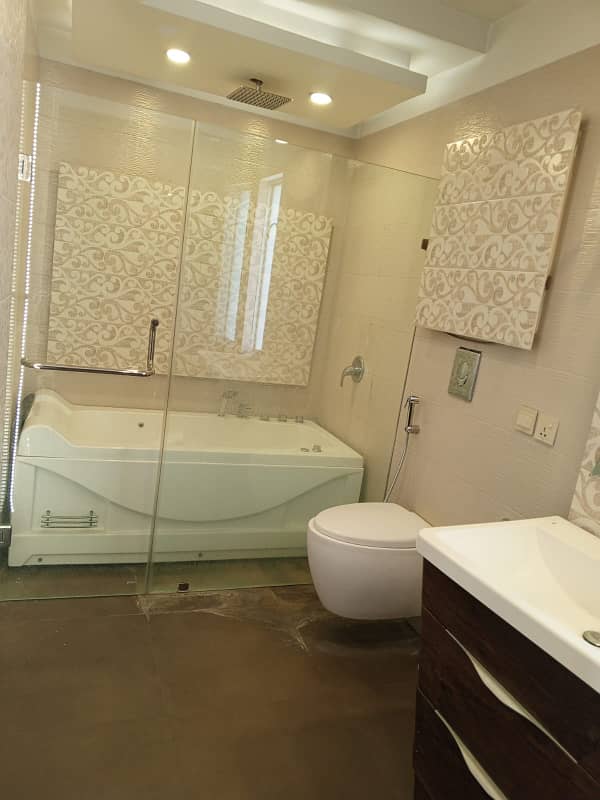 D H A Lahore 1 kanal Mazher Munir Design House Fully Furnished with 100% original pics available for Rent 28