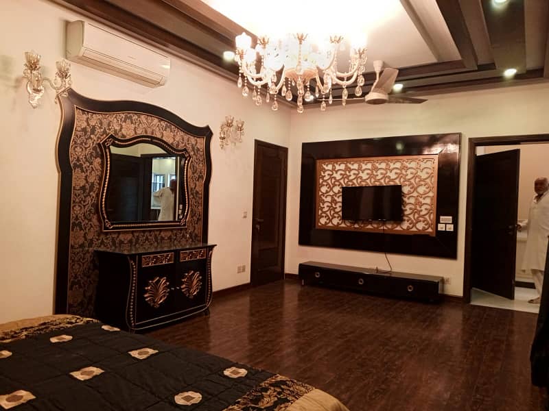 D H A Lahore 1 kanal Mazher Munir Design House Fully Furnished with 100% original pics available for Rent 34