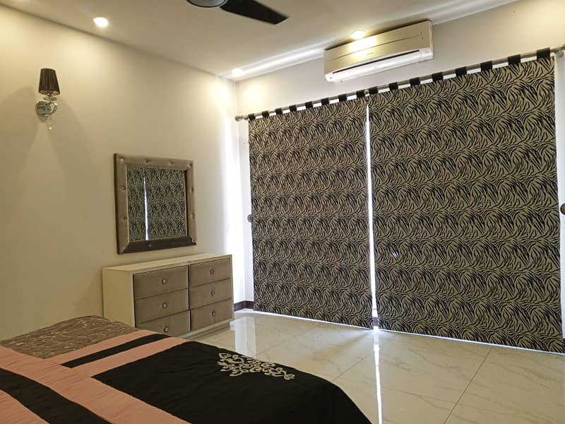 D H A Lahore 1 kanal Mazher Munir Design House Fully Furnished with 100% original pics available for Rent 41