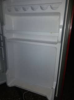 dawlance mini fridge