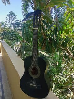 Ukuleles guitar ( 30 inch length)