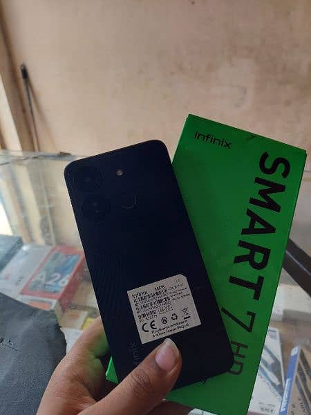 Infinix smart 7HD 4/64  in warranty box charger complete accessorie 1