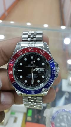 : ROLEX GMT-MASTER II PEPSI BLUE AND RED BEZEL STAINLESS STEEL JUBILEE 0