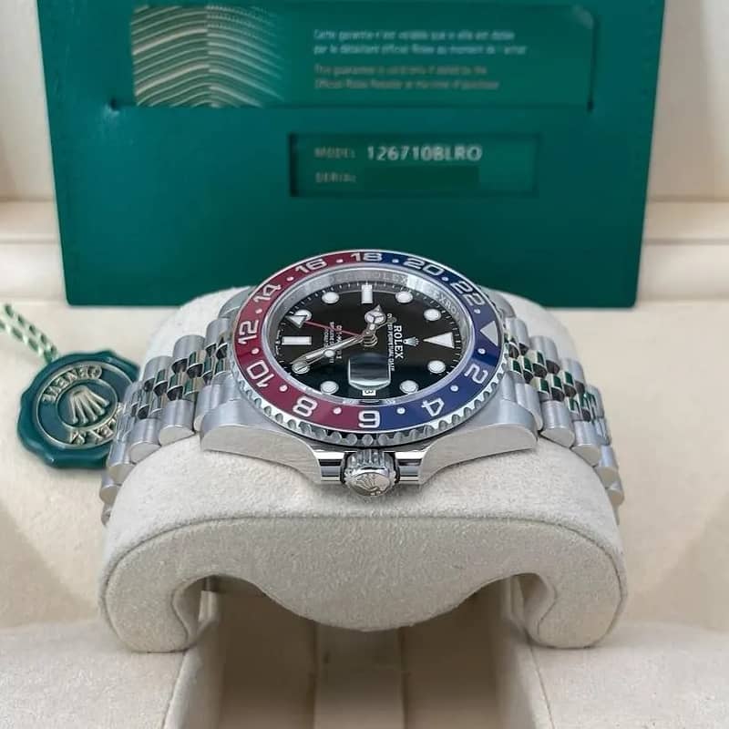 : ROLEX GMT-MASTER II PEPSI BLUE AND RED BEZEL STAINLESS STEEL JUBILEE 1