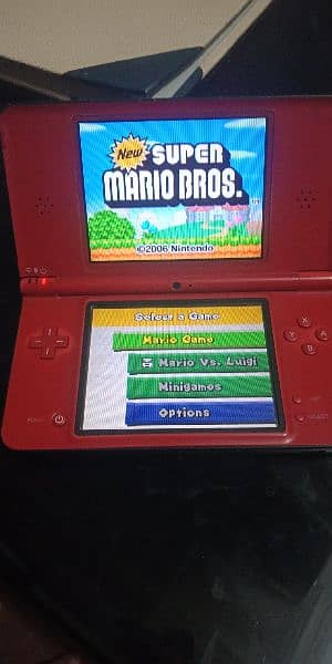 Nintendo dsi xl red 25th anniversary special edition 1