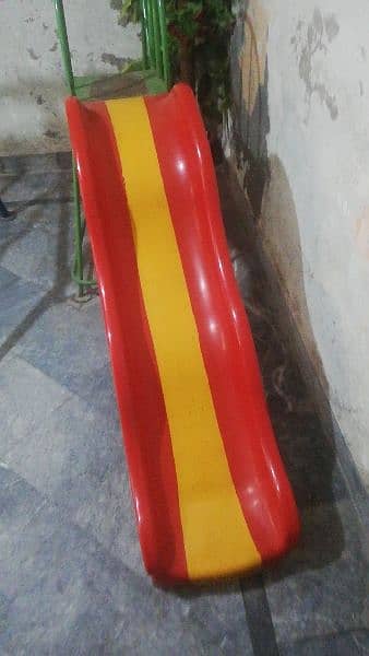 fiber  slide with iron stand in Good condition 0