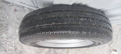 Single Tyre with Rim of Subuzi bolan