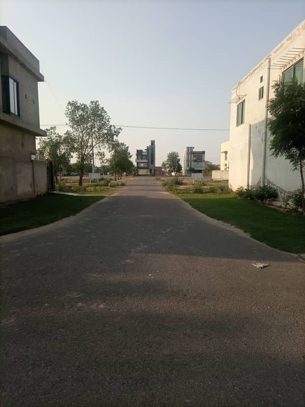 5 MARLA POSSESSION RESIDENTIAL PLOT ON HOT LOCATION FOR SALE IN KHAYABAN E AMIN L BLOCK LAHORE. 12