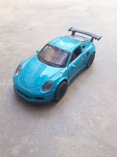 Porcshe 911 toy car in blue colour 0