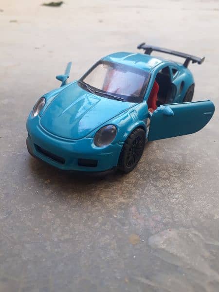 Porcshe 911 toy car in blue colour 2