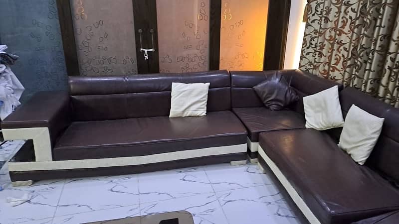 L shape sofa for sale 8 seater along with center table, slightly used 1