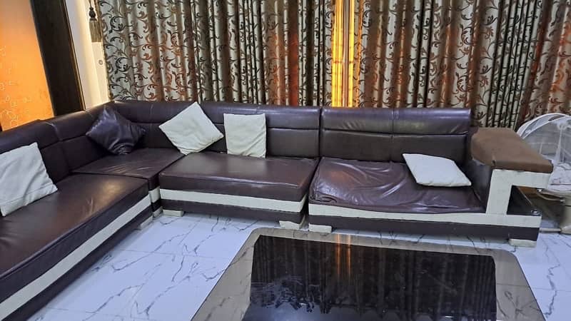 L shape sofa for sale 8 seater along with center table, slightly used 3