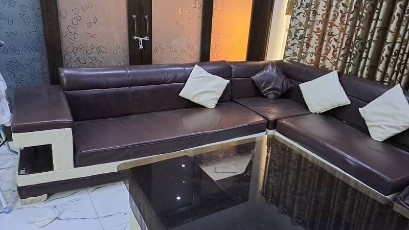 L shape sofa for sale 8 seater along with center table, slightly used 7