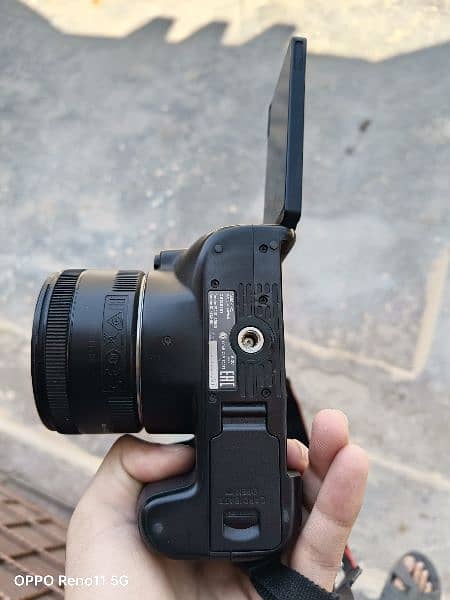 Canon 250d + 50mm f1.8 + 30mm f1.4 lense 4