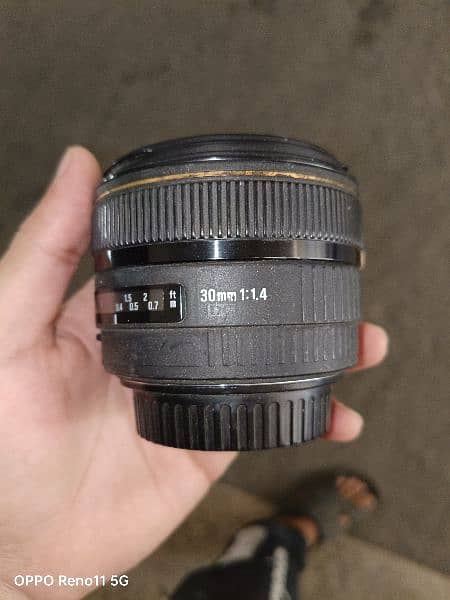 Canon 250d + 50mm f1.8 + 30mm f1.4 lense 10