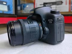 Canon 7D DSLR with 35-135mm